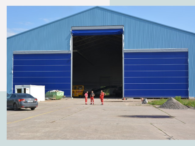 Ангарные ворота в Еманжелинск от СтальСтрой-Мнж по цене 616 руб.